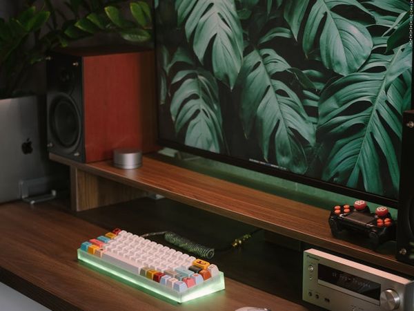 A person integrating a wellness routine into a modern home office setup.