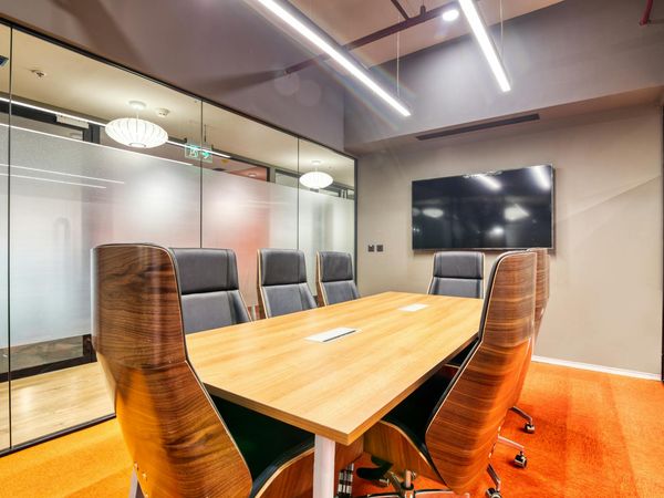 A well-lit and ergonomic home office space designed for comfort.